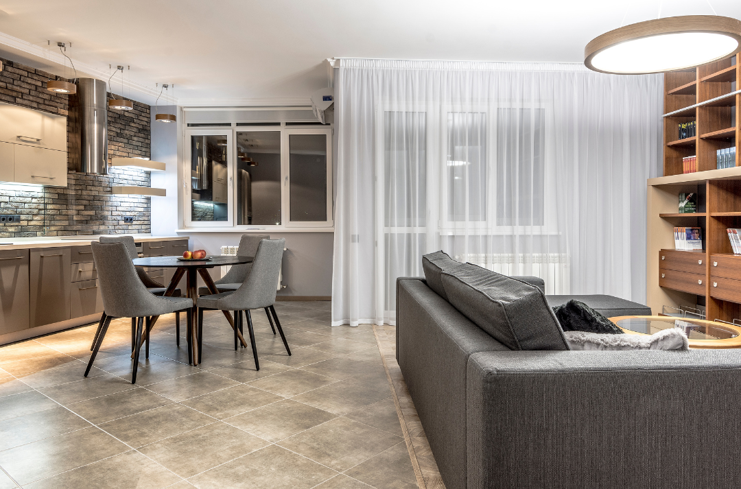 Living room of house decorated with gray and brown.