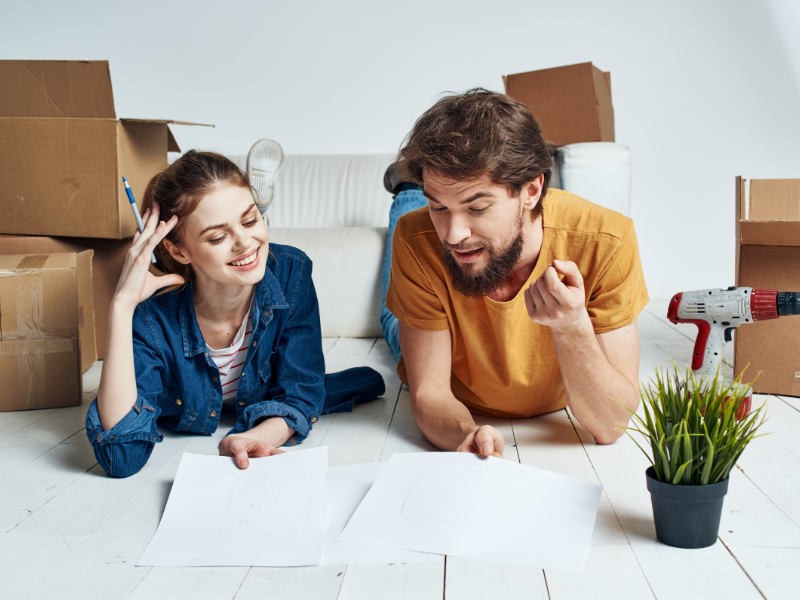 a couple looking through their Post-Move Checklist